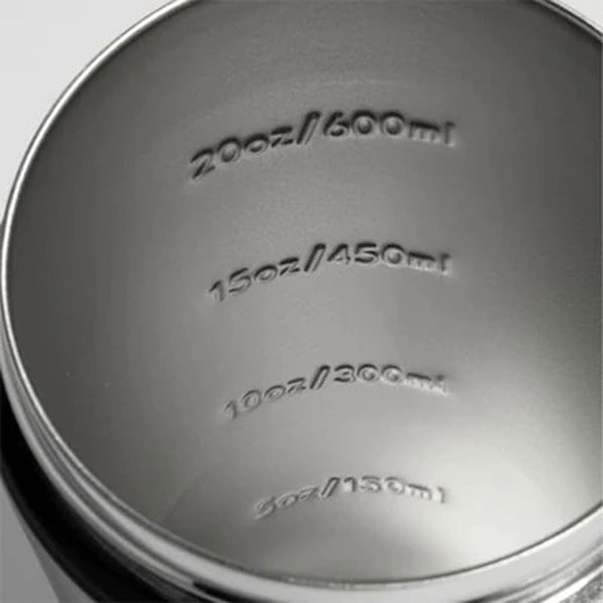 This image shows a close up view of the inside of the Ice Shaker 26oz shaker bottles. It contains a 5oz/150ml measurement line, a 10oz/300ml measurement line, a 15oz/450ml measurement line, and a 20oz/600ml measurement line.