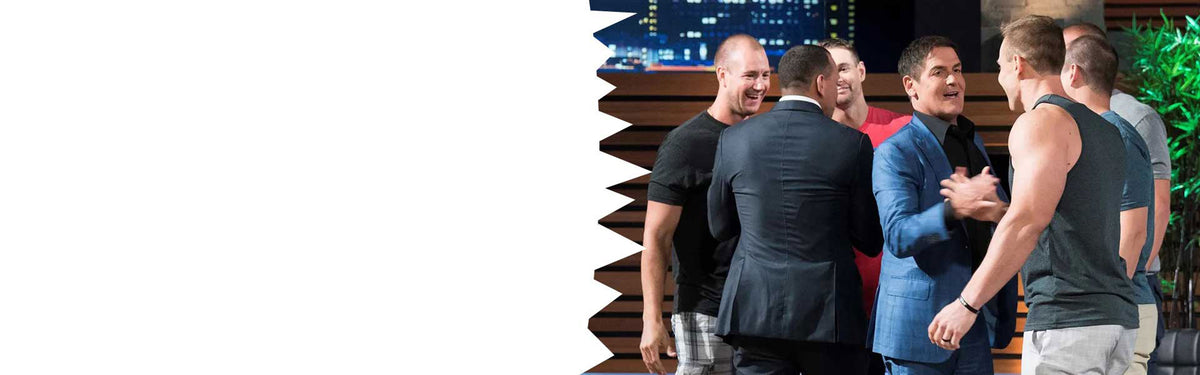 Ice Shaker founder Chris Gronkowski shaking hands with Mark Cuban on the Shark Tank set