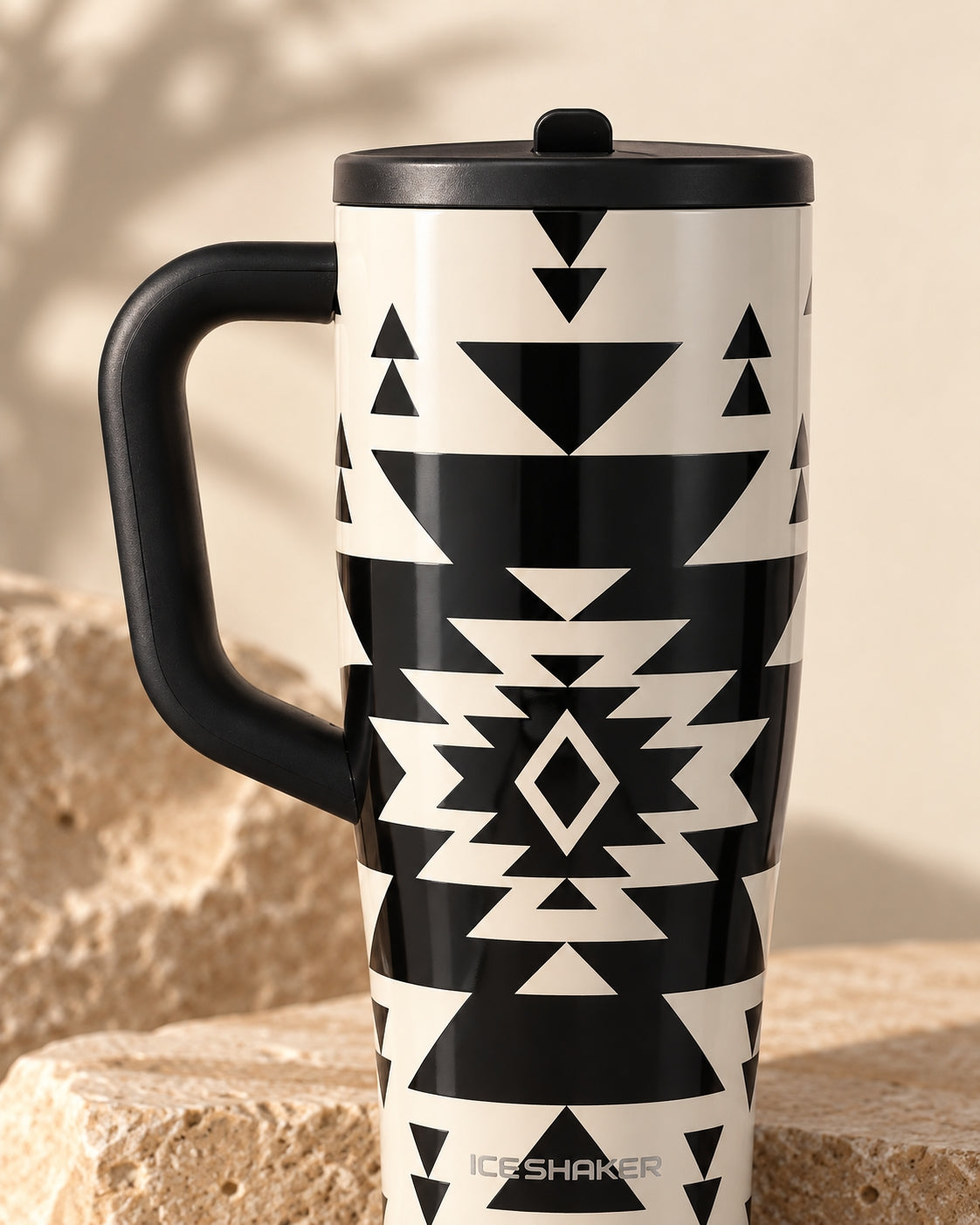 Ritual tumbler handle and lid detail on sandstone