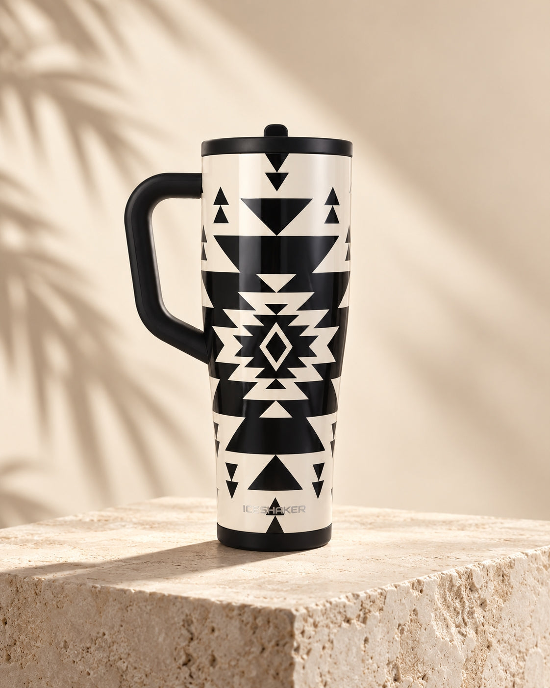 Ritual Legend Series shaker tumbler on a travertine block in warm sunlight